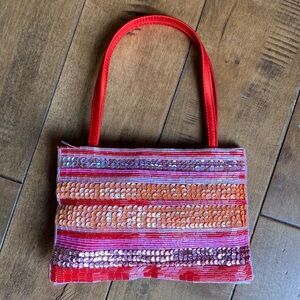 Vintage Jessica McClintock small purse with handle. Shoulder strap inside.